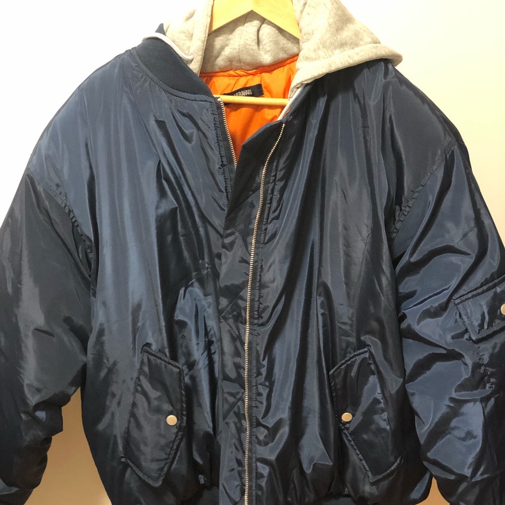 Blue bomber jacket with grey hood